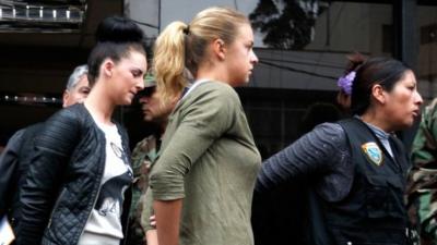 Michaella McCollum and Melissa Reid are led from police station in Peru