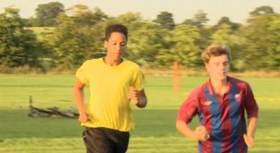 Quinton Barham (l) in training with teammates at Bradford Town Youth Football Club