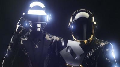 Daft Punk in May 2013, celebrate topping the UK album chart for the first time in their 20 year career