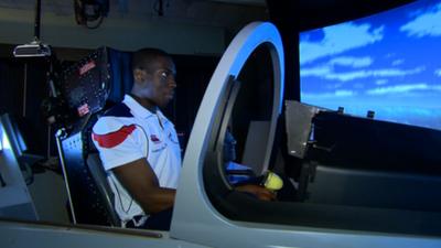 Lutalo Muhammad in a flight simulator