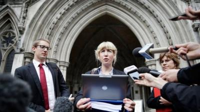 Lawyer Gwendolen Morgan, acting for David Miranda who was stopped and questioned by British police at Heathrow airport under terrorism laws, speaks to the media outside a London court