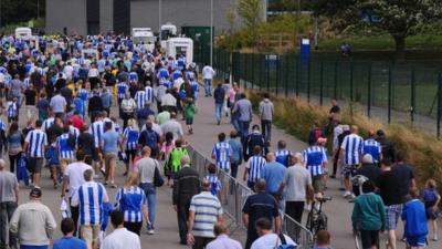 Brighton and Hove Albion fans on way to match