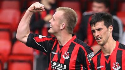 Jordan Owens celebrates scoring against Linfield