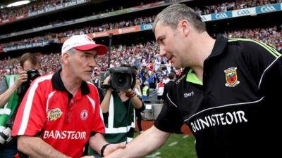 Tyrone's Mickey Harte congratulates James Horan at the end of the All Ireland semi-final