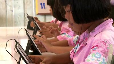 Thai children with tablet computers