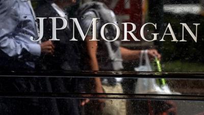 People walk by JP Morgan Chase Company headquarters in New York