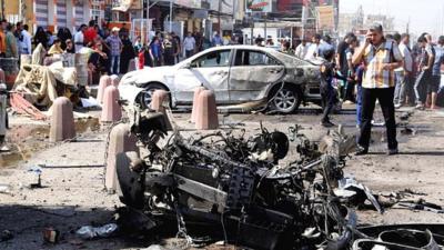 Car wreckage in Sadr City