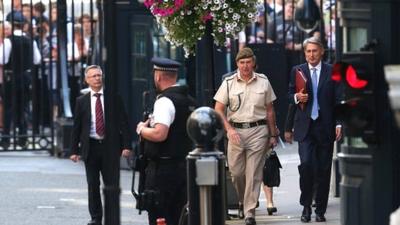 Politicians and military leaders arrive at Downing Street