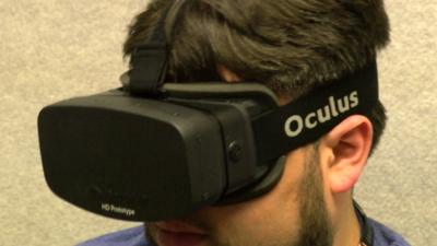 A man wearing an Oculus Rift headset