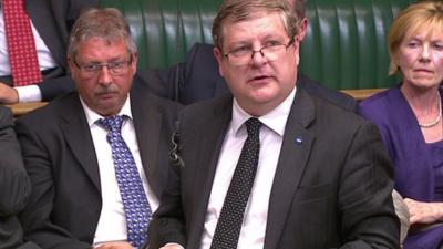 SNP MP Angus Robertson (centre)