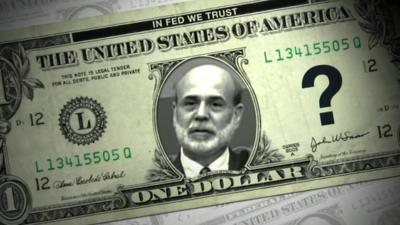 A US dollar bill with Ben Bernanke's portrait on the front