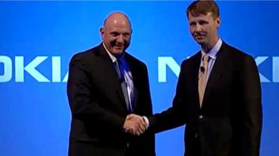 Steve Ballmer and Risto Siilasmaa shake hands