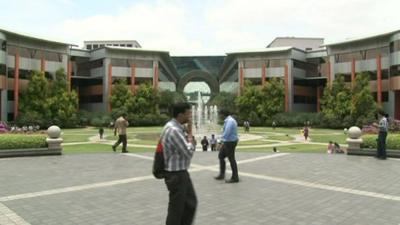 Smart tech offices with people outside the building.