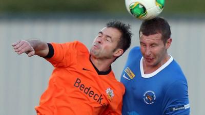 Match action from Ballinamallard against Glenavon