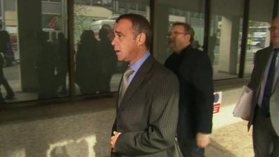 Michael Le Vell (centre) arriving at Manchester Crown Court this morning