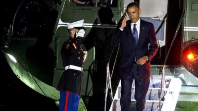 President Barack Obama returns to the White House in Washington