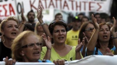 Protesters shout slogans during a rally in Thessaloniki,