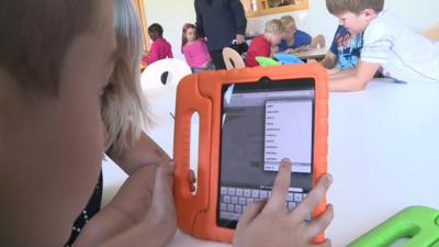 Boy with tablet computer