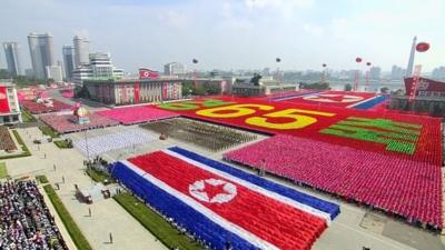 North Korean soldiers and performers participate in a mass military parade to celebrate the 65th anniversary of the countrys founding