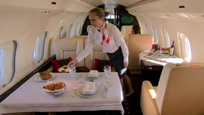 Cabin crew in private jet