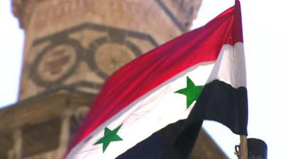 Syrian flag outside catherdral