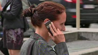 Woman using mobile phone