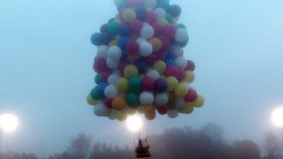 Jonathan Trappe setting off with his balloons