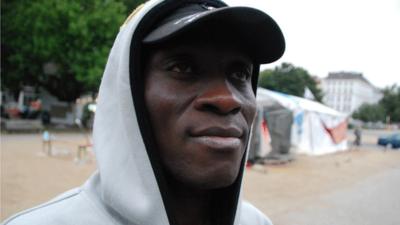 Dickson Mobosi, Nigerian refugee from Libya, at the protest camp on Oranienplatz, Berlin