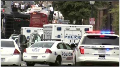 Police cars at the Navy Yard complex in central Washington