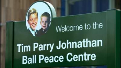 A sign reading Tim Parry Johnathan Ball Peace Centre. This is where Martin McGuinness will speak.