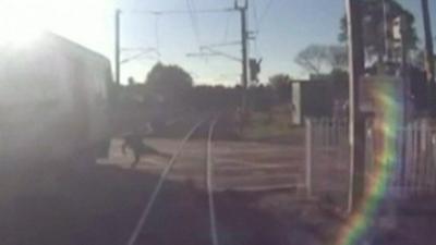 CCTV footage of pedestrian narrowly missing an oncoming train