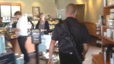 Man carrying rifle into Starbucks in the US