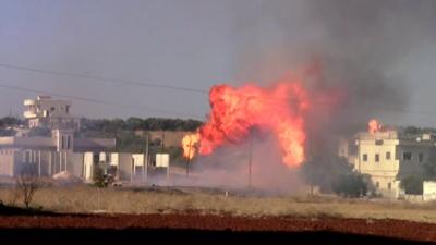 Burning building in Syria