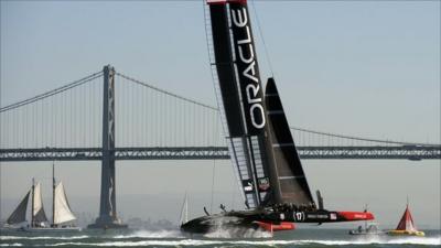 Oracle Team USA crosses the finish line ahead of Emirates Team New Zealand