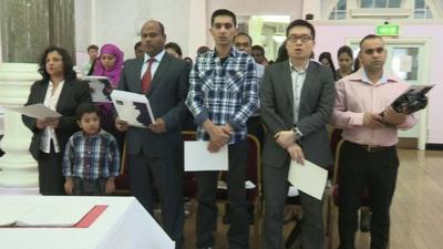 People at a citizenship ceremony