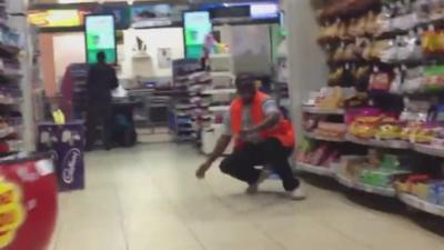 Men inside a supermarket