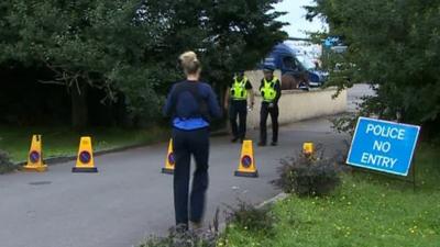 Police at entrance to farm near Marshfield