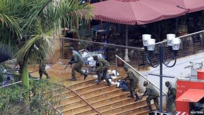 Kenyan defence forces taking position on the steps of the Westgate mall