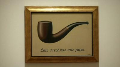 Magritte painting of a pipe with writing underneath saying this is not a pipe in French