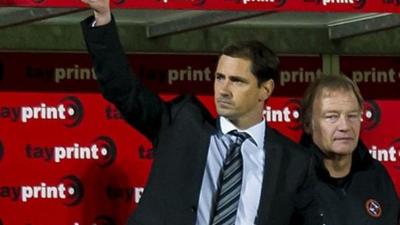 Dundee United manager Jackie McNamara (left)