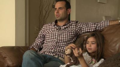 Costas Kariolis and his daughter, who racked up a £300 smartphone bill from in-app purchasing