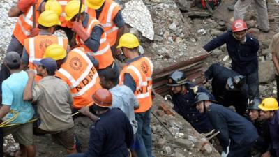 Search for survivors in collapsed building in Mumbai