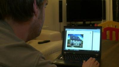 Chris looks at new home online