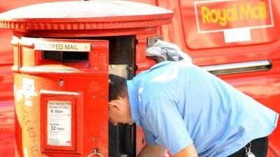 Mail worker collecting post