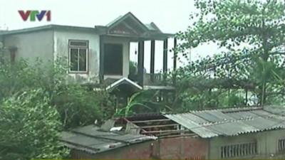 Building affected by Typhoon Wutip