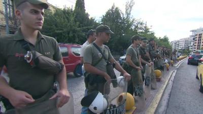 Police lines outside Athens court where neo-Nazi Golden Dawn members appeared