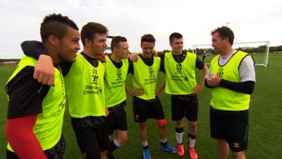 Robbie Fowler with Liverpool youth players