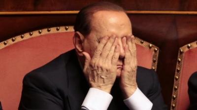 Italian center-right leader Silvio Berlusconi gestures during a confidence vote at the Senate in Rome, October 2, 2013.