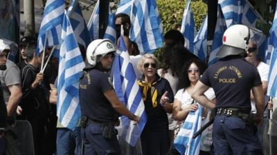 Riot police and supporters outside court