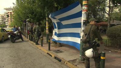 Greek flag opposite court in Athens